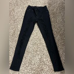 Skinny stretchy ripped black jeans